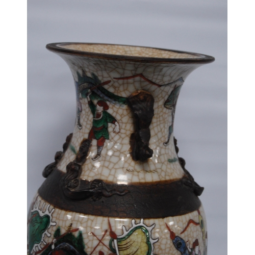 263 - Chinese crackle glazed vase (20th century) decorated with a battle scene in polychrome enamels, with... 