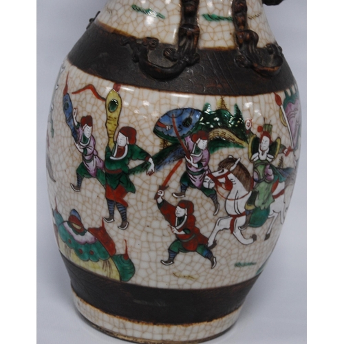 263 - Chinese crackle glazed vase (20th century) decorated with a battle scene in polychrome enamels, with... 