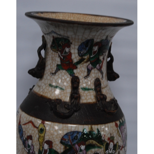 263 - Chinese crackle glazed vase (20th century) decorated with a battle scene in polychrome enamels, with... 