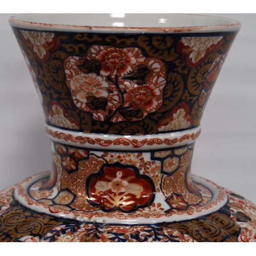 264 - Oriental Imari vase of bulbous form decorated all over with floral panels and blossoming trees in a ... 