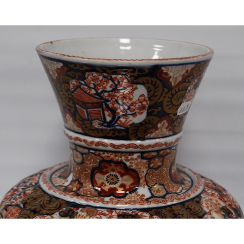 264 - Oriental Imari vase of bulbous form decorated all over with floral panels and blossoming trees in a ... 