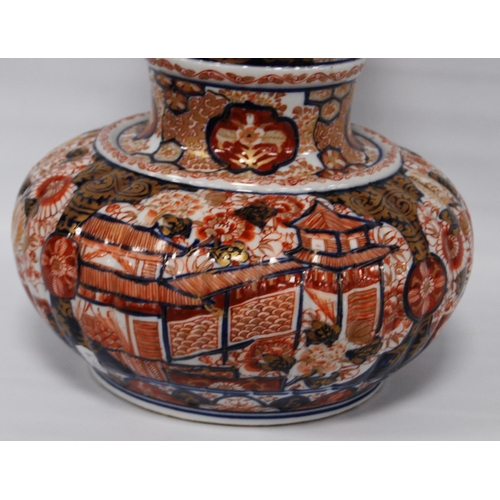 264 - Oriental Imari vase of bulbous form decorated all over with floral panels and blossoming trees in a ... 