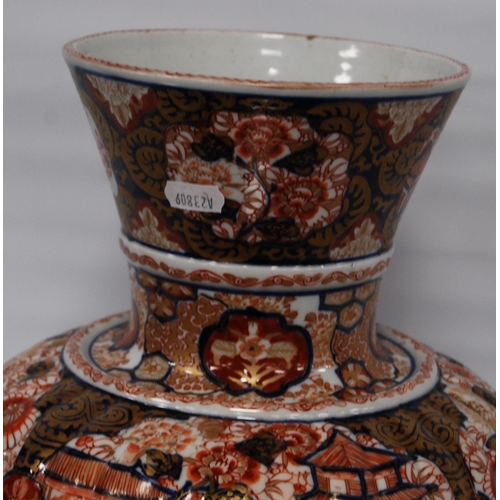 264 - Oriental Imari vase of bulbous form decorated all over with floral panels and blossoming trees in a ... 