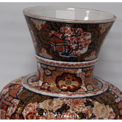 264 - Oriental Imari vase of bulbous form decorated all over with floral panels and blossoming trees in a ... 