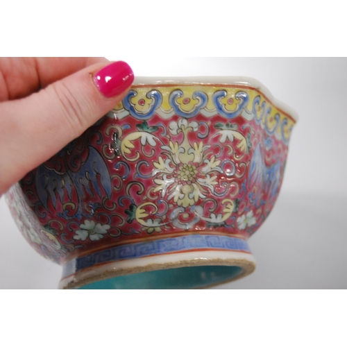 265 - Three Chinese porcelain Qianlong (1711 - 1799) famille rose octagonal bowls, red seal mark to the tu... 