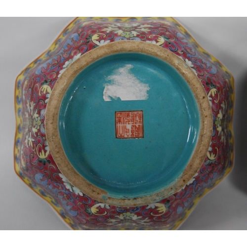 265 - Three Chinese porcelain Qianlong (1711 - 1799) famille rose octagonal bowls, red seal mark to the tu... 