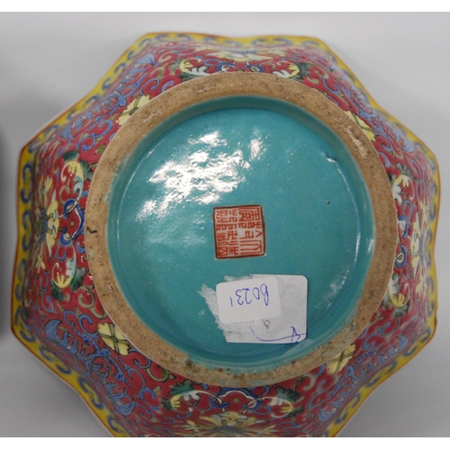 265 - Three Chinese porcelain Qianlong (1711 - 1799) famille rose octagonal bowls, red seal mark to the tu... 