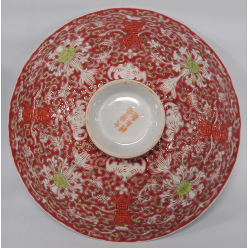 266 - Two near-matching Chinese famille rose porcelain bowls, decorated all over with ruyi, floral panels ... 