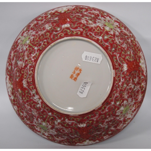 266 - Two near-matching Chinese famille rose porcelain bowls, decorated all over with ruyi, floral panels ... 