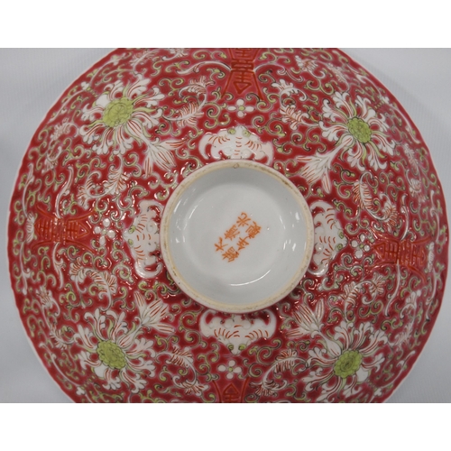 266 - Two near-matching Chinese famille rose porcelain bowls, decorated all over with ruyi, floral panels ... 