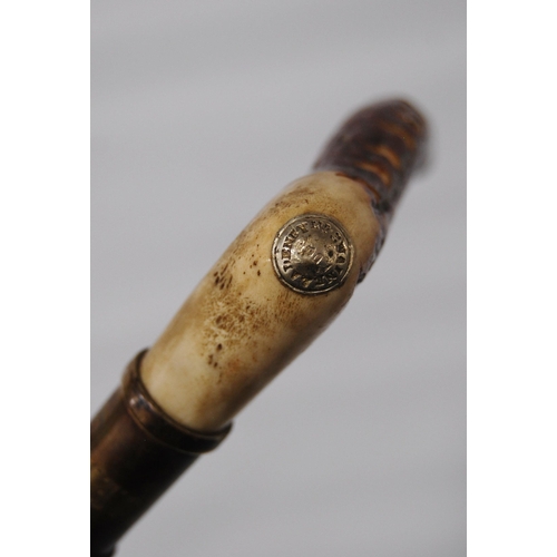 196 - Two George VI period riding crops by Swaine & Adeney, London, both with maker's button to the an... 