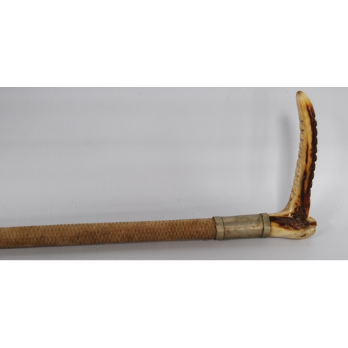 197 - Two George VI period riding crops, both with antler handles above a silver and white metal collar, b... 