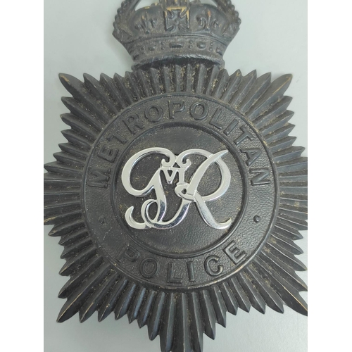 223 - British Police. Metropolitan Police George VI helmet plate with three lug fittings and a 1940s Worce... 