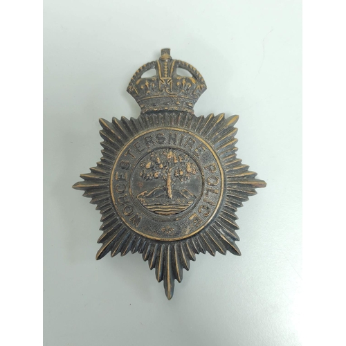 223 - British Police. Metropolitan Police George VI helmet plate with three lug fittings and a 1940s Worce... 