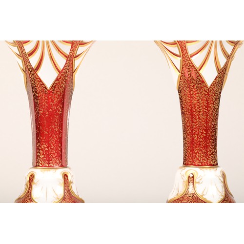 29 - Pair of Bohemian white overlay and gilt ruby vases, of flared baluster form, height 38cm