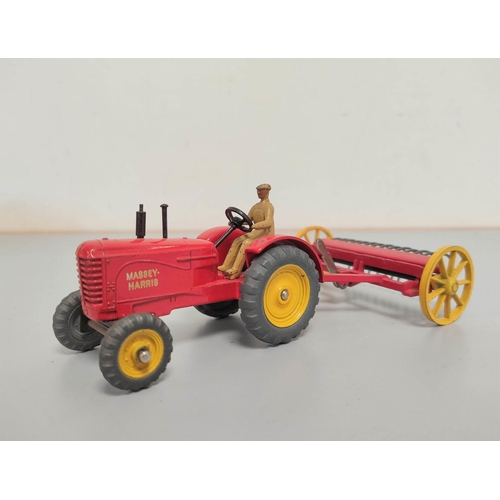 3 - Dinky Toys. Boxed die-cast Farm Tractor & Hay Rake 310. 