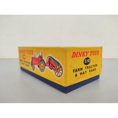 3 - Dinky Toys. Boxed die-cast Farm Tractor & Hay Rake 310. 