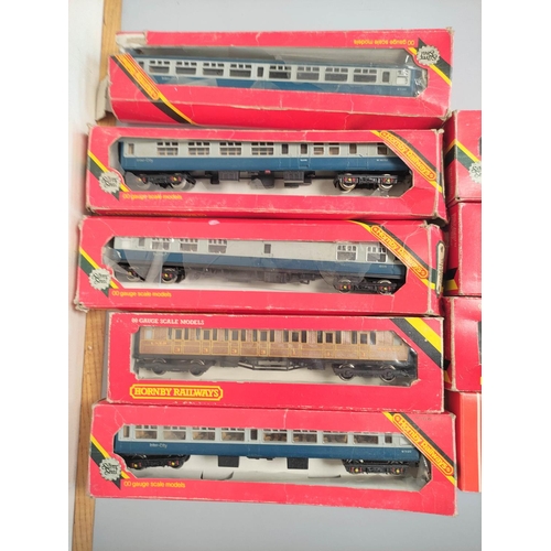 146 - Hornby. Nine boxed carriages comprising of four Inter-City MK2 Coaches R921, Inter-City Buffet Car R... 