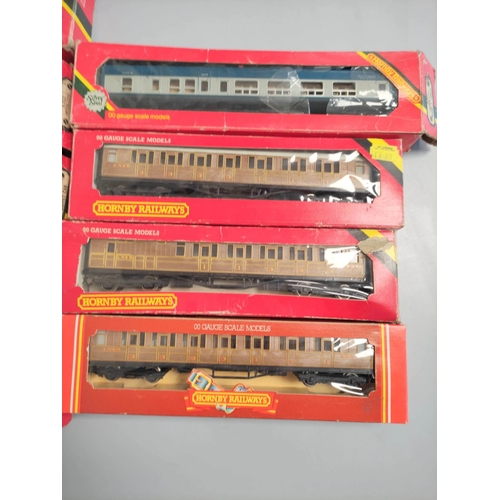 146 - Hornby. Nine boxed carriages comprising of four Inter-City MK2 Coaches R921, Inter-City Buffet Car R... 