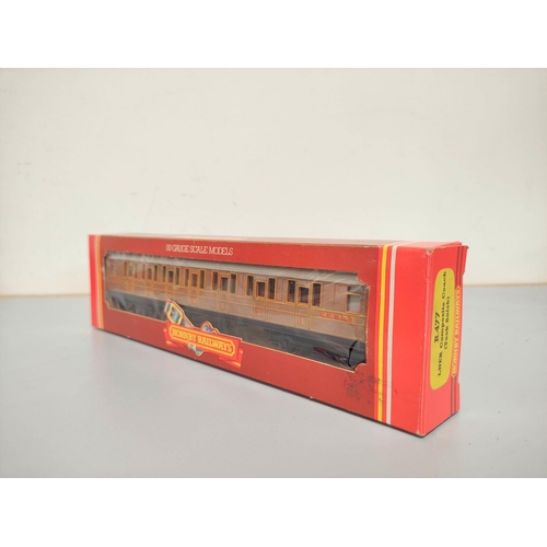 146 - Hornby. Nine boxed carriages comprising of four Inter-City MK2 Coaches R921, Inter-City Buffet Car R... 