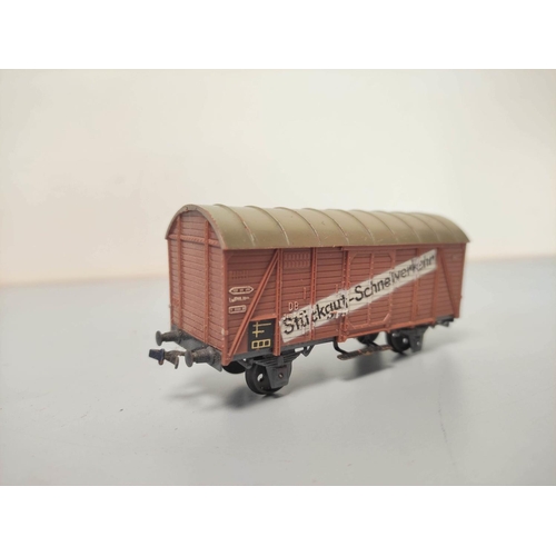 147 - Box of model railway rolling stock with manufacturers to include Tri-ang, Wrenn, Mainline, Marklin e... 