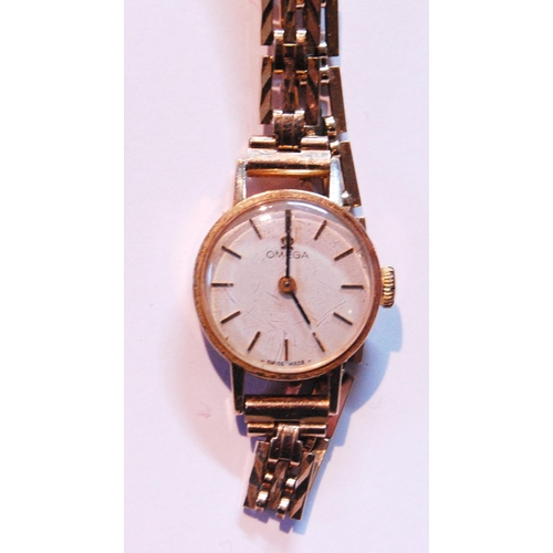 140 - Lady's Omega 9ct gold bracelet watch, 1982, 14g gross.