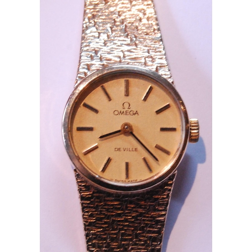 132 - Lady's Omega 9ct gold bracelet watch, 1973, two spare links, 30g gross.