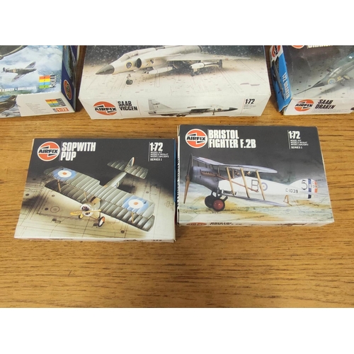 23 - Eleven Airfix boxed model airplanes to include Supermarine Spitfire MK1 01071, H.P Hampden 491, Horm... 