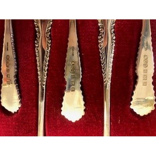 155 - Boxed set of twelve sliver tea spoons, assay marked London 1959 by Garrard & Co, total weight 26... 