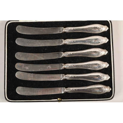 161 - Silver handled knives in case