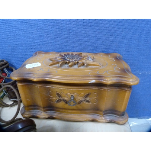 1 - Collection of decorative items including tins, carved wooden box, mantel clock, pair of vintage head... 