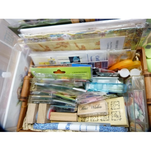 137 - Two cartons containing assorted craft items to include rubber stamps, scrapbooking supplies, card to... 