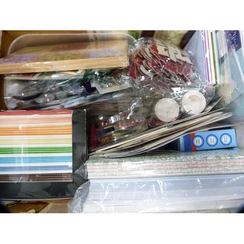 137 - Two cartons containing assorted craft items to include rubber stamps, scrapbooking supplies, card to... 