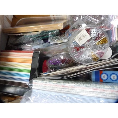 137 - Two cartons containing assorted craft items to include rubber stamps, scrapbooking supplies, card to... 