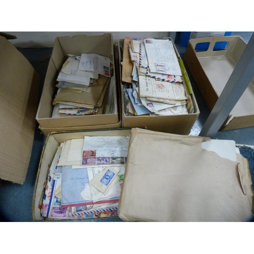 145 - Three cartons containing a quantity of stamps, some franked.