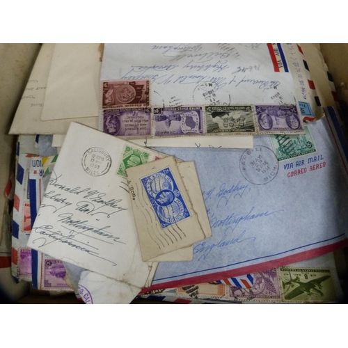 145 - Three cartons containing a quantity of stamps, some franked.