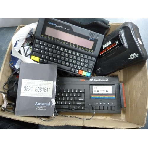 151 - Amstrad Notepad computer, Sega Master System II, ZX Spectrum +2 computer, assorted games etc.