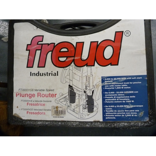 153 - Freud electric plunge router and accessories, cased.