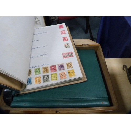 160 - Group of assorted stamps enclosed in a small wooden collector's box.