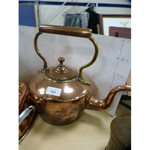 161 - Group of copper to include a copper and brass tea kettle, syphon, moulds, brandy pan, chestnut roast... 