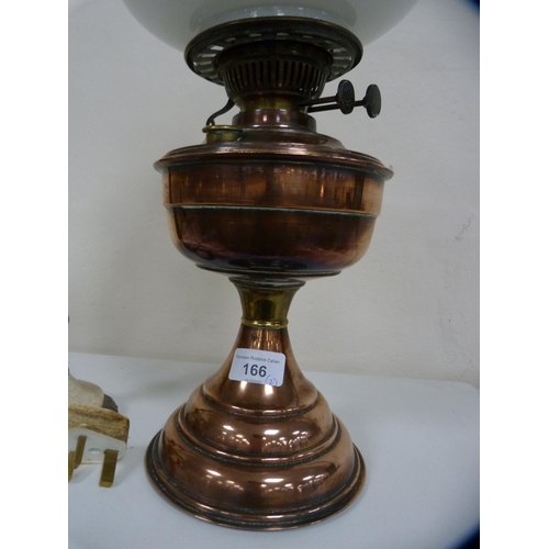 166 - Copper and brass oil lamp and a table lamp.  (2)