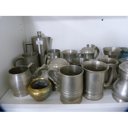 168 - Collection of pewter tankards, studio pottery tankards etc (one shelf).