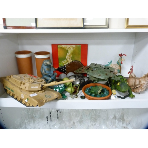 178 - Toys to include a tank, also frog and chicken ornaments, carpet-style bowls, bellows etc (one shelf)... 