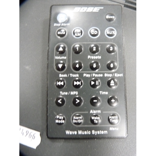 18 - Bose Wave music system with remote control.