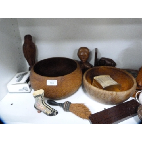 183 - Treen and wooden items to include bowls, string holder, bookends, also a cigarette box, ornaments et... 