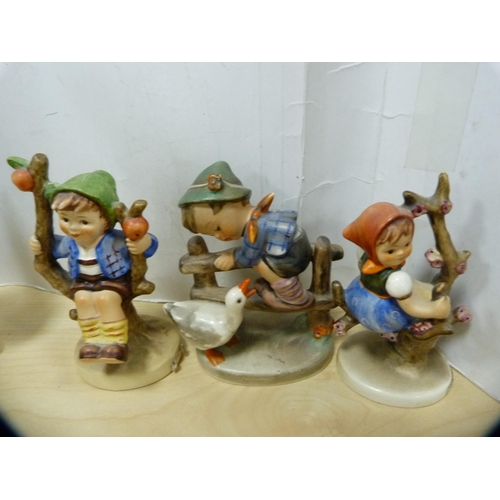 21 - Collection of nine Hummel figures.