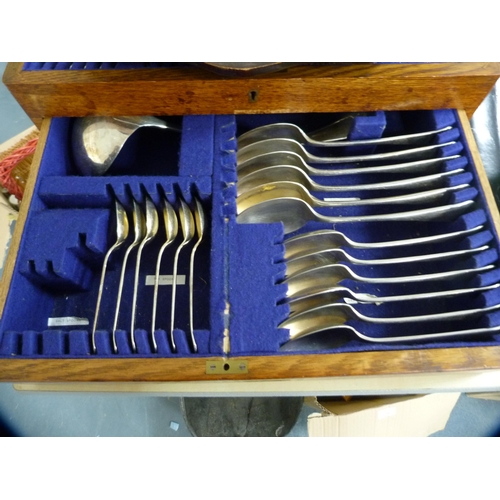 210 - Oak-cased canteen of cutlery.