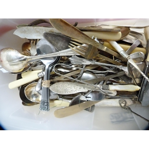 214 - Carton containing loose cutlery to include mother of pearl-handled cutlery and other flatware.