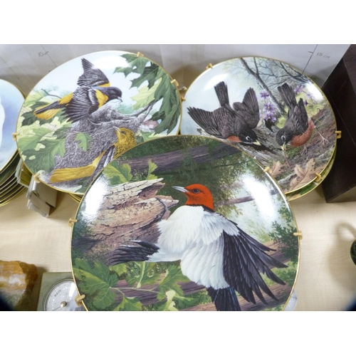 223 - Large quantity of collector's plates, some Limoges, mostly decorated with animals and birds.