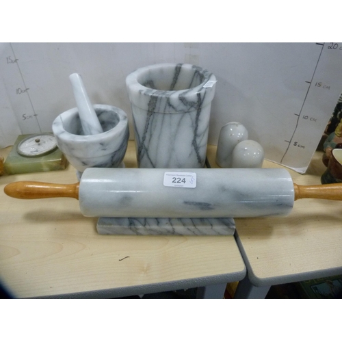 224 - Composition marble items to include a rolling pin on stand, mortar and pestle, cylindrical stand, sa... 